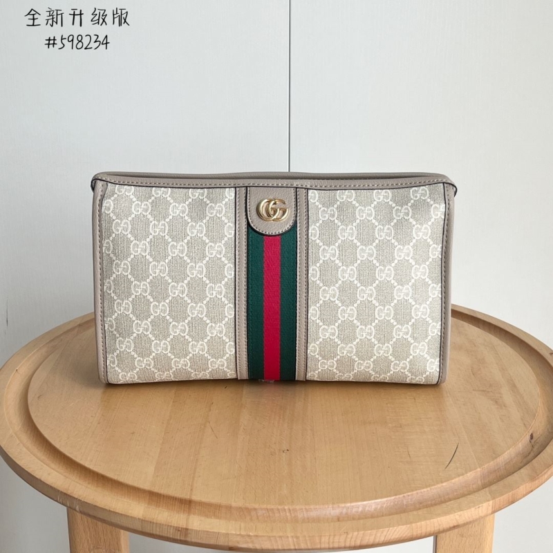 G*u*i clutch bags
